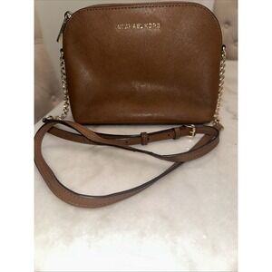 MICHAEL Michael Kors "Jet Set" travel bag in saffiano leather w/golden hardware.